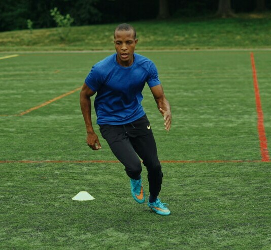 player running in cones