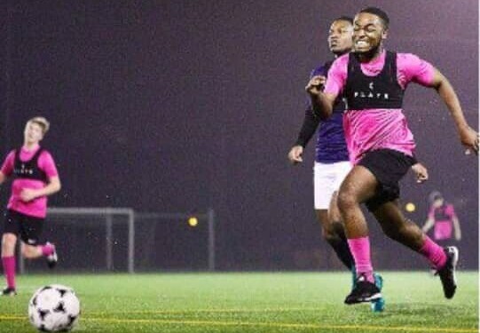 player with gps vest