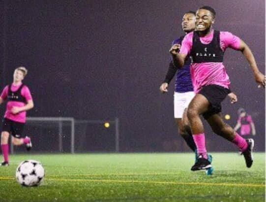 players with gps vest